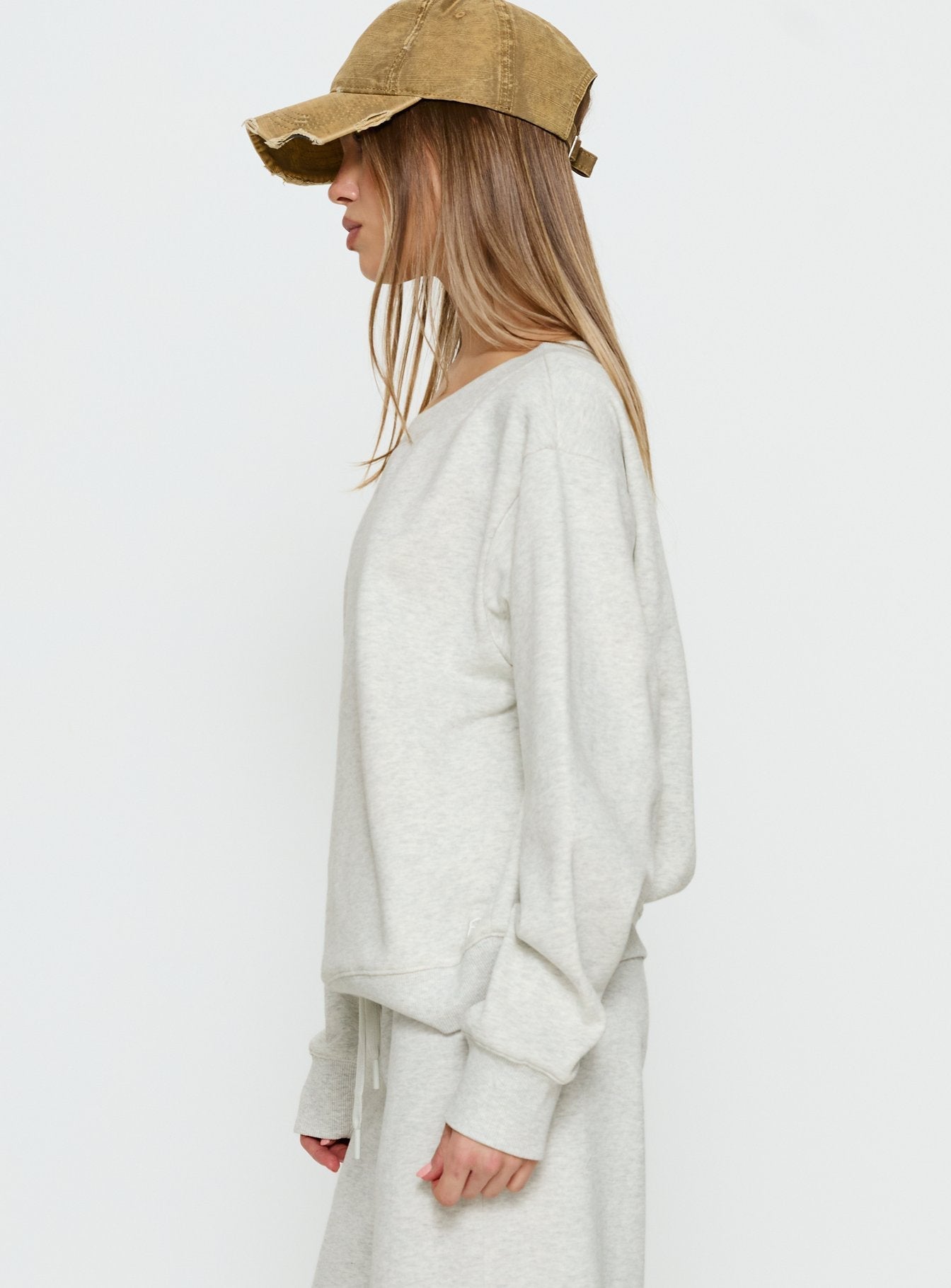side view of model wearing Princess Polly Wellness Off the Shoulder Jumper Grey Marle 
