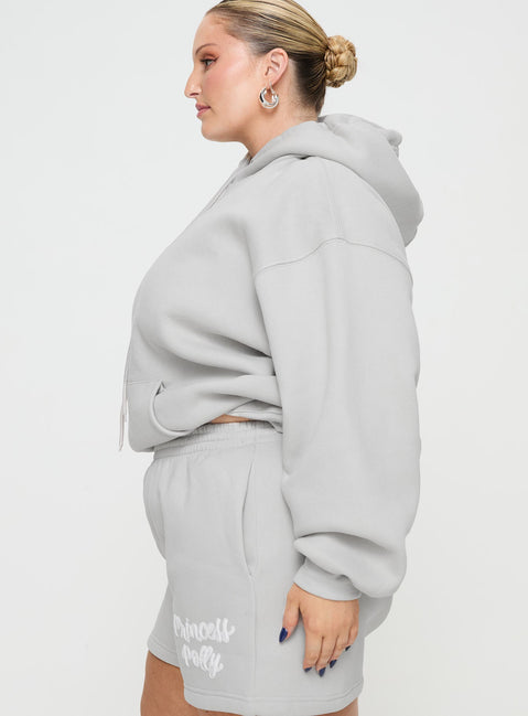 side view of model wearing Princess Polly Princess Polly Hooded Sweatshirt Puff Text Grey Curve 