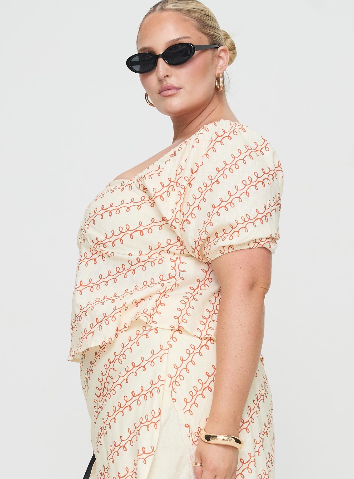 side view of model wearing Princess Polly Passionfruit Linen Blend Top Multi Curve Half Sleeves Square Neck 