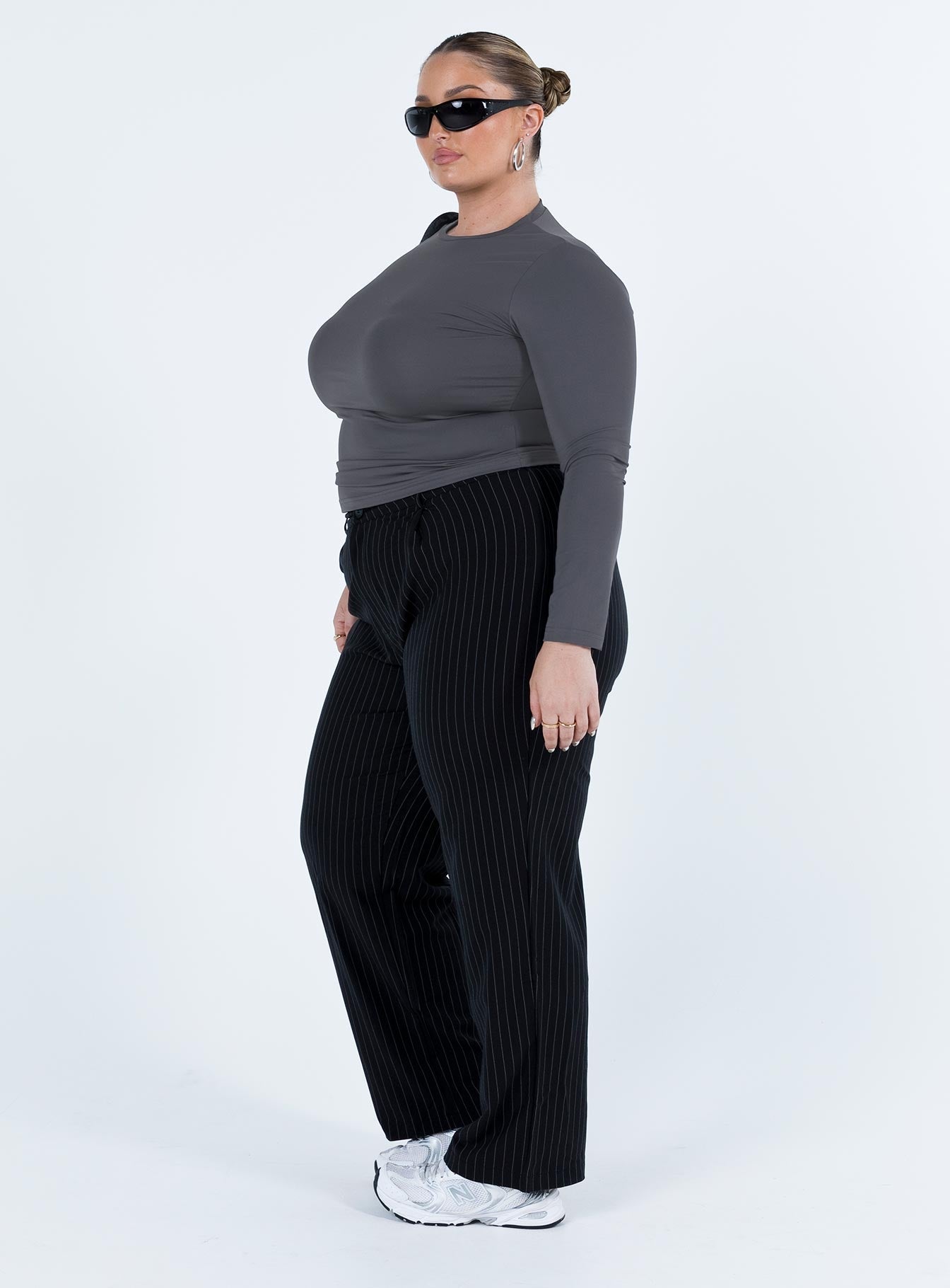 Front view of model wearing  front Princess Polly High Waisted Pants High Waisted Pants  Titius Pants Black Curve