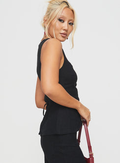 side view of model wearing Princess Polly Spirito Vest Top Black Sleeveless Scoop Neck 