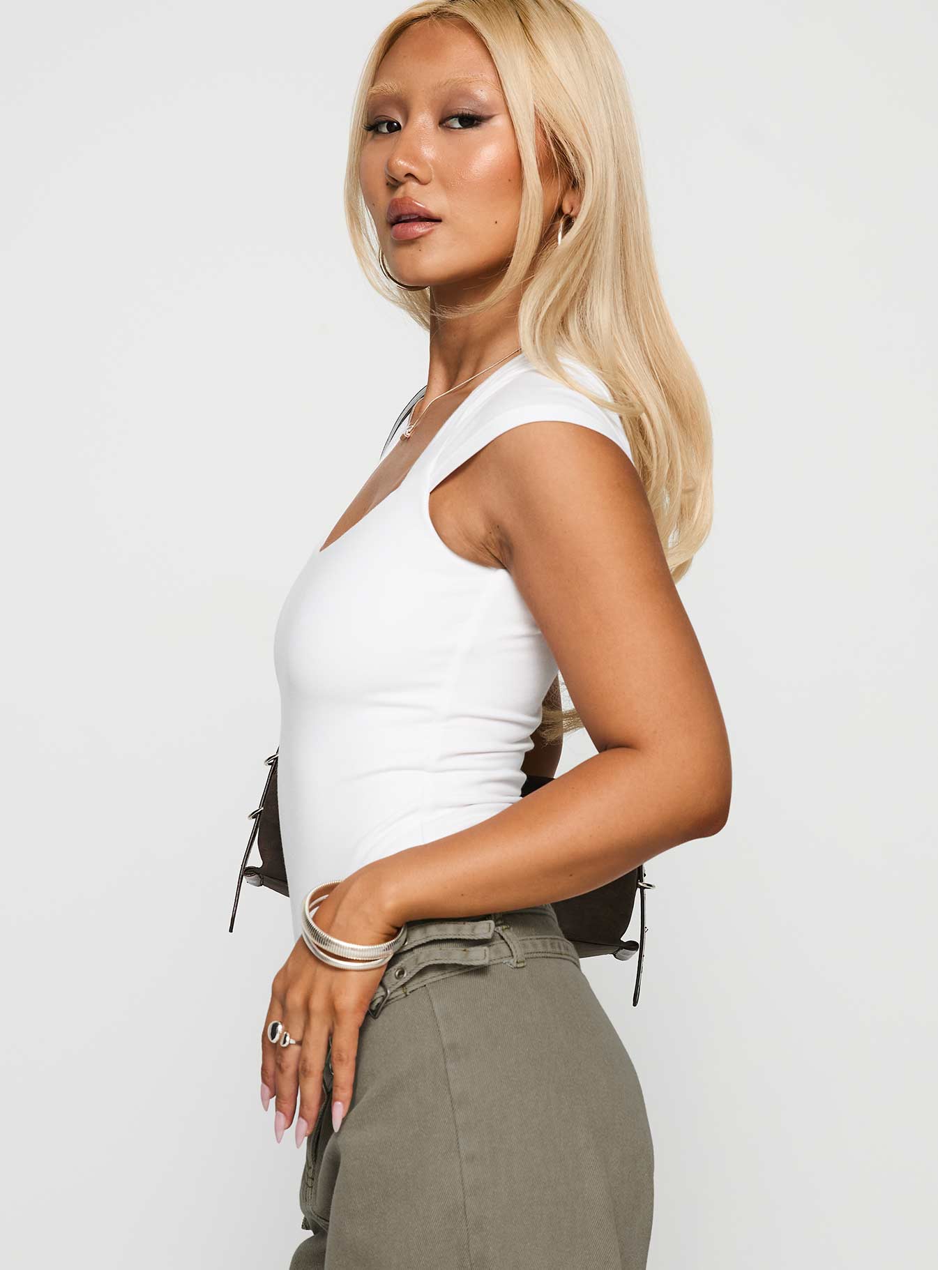 side view of model wearing Princess Polly Want You Forever Bodysuit White Short Sleeves 