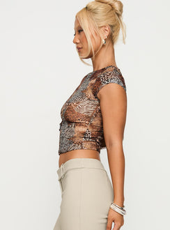 side view of model wearing Princess Polly Tied In Short Sleeve Top Leopard Short Sleeves Crew Neck 