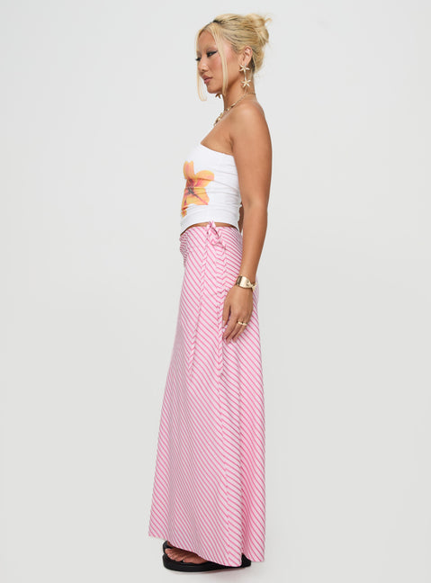   side view of model wearing Princess Polly Fluttering Maxi Skirt Pink Stripe Maxi 