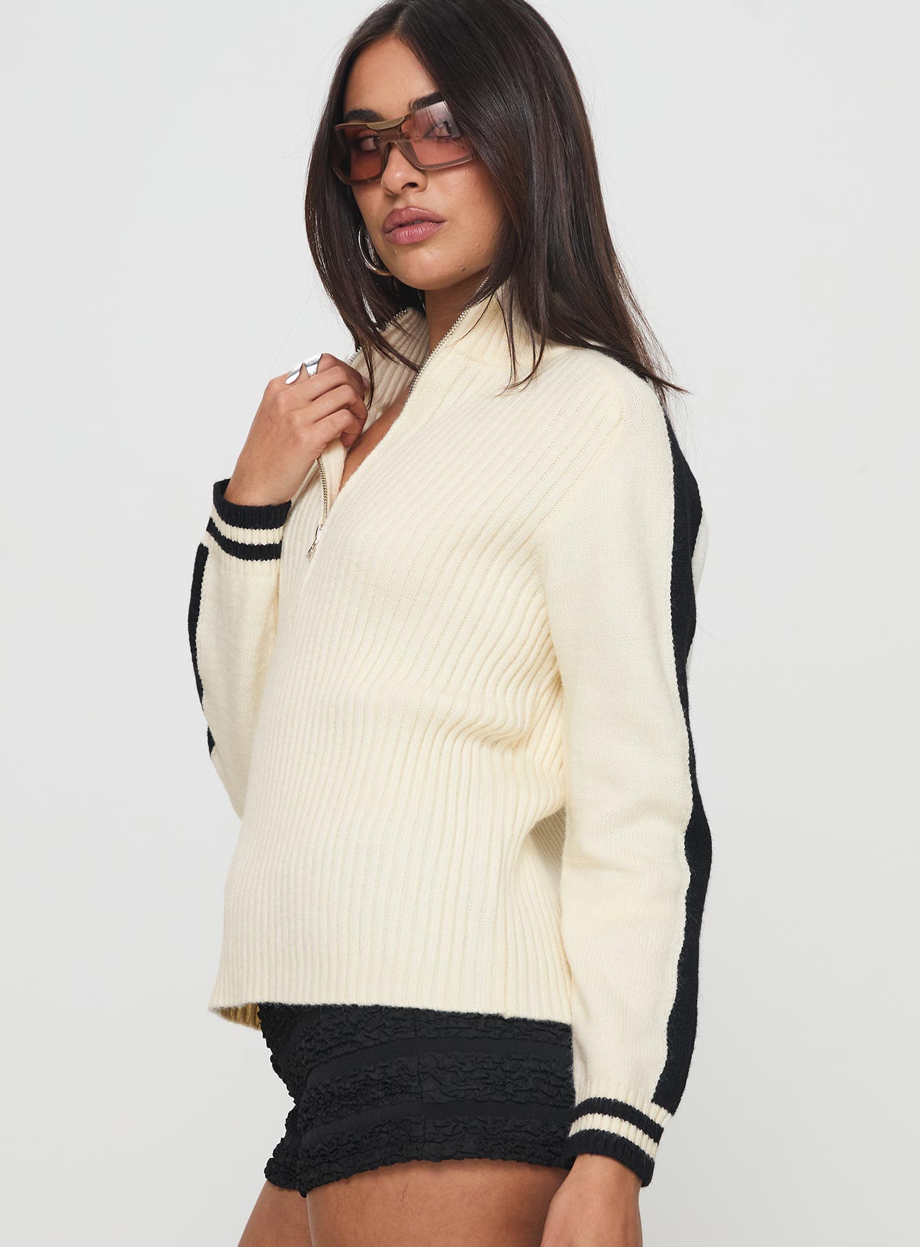 side view of model wearing Princess Polly Mandee Quarter Zip Knit Sweater Cream Long 