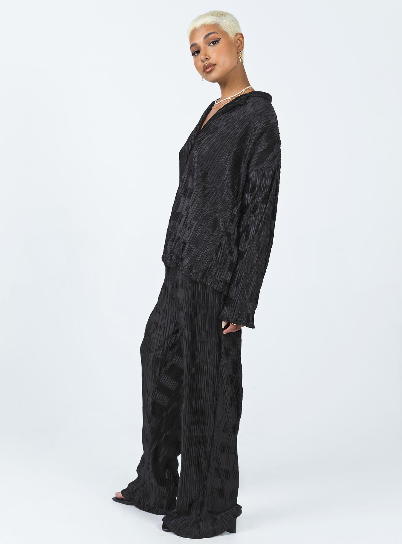 Matching set Silky material  Pleated design  Button up shirt  Drop shoulder  High waisted pants  Elasticated waistband  Good stretch 