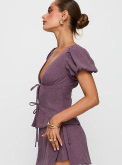side view of model wearing Princess Polly Wilhelmina Blouse Top Mauve Short Sleeves Plunger 