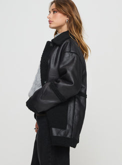 Faux leather jacket  Oversized fit, classic collar, press button fastening, twin hip pockets Non-stretch material, shearling lining