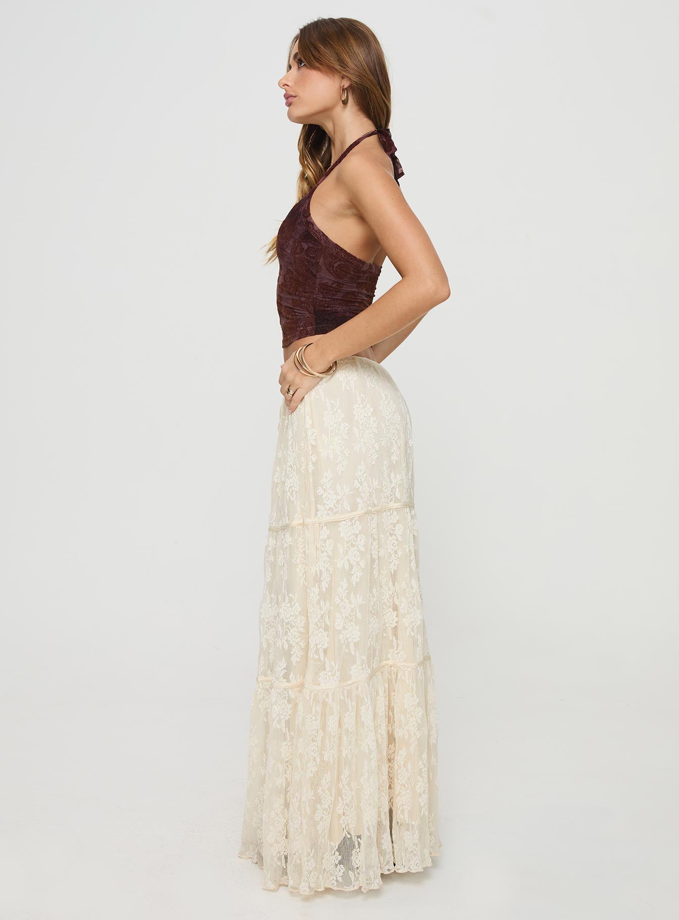   side view of model wearing Princess Polly Oh Plisse Maxi Skirt Cream Maxi 