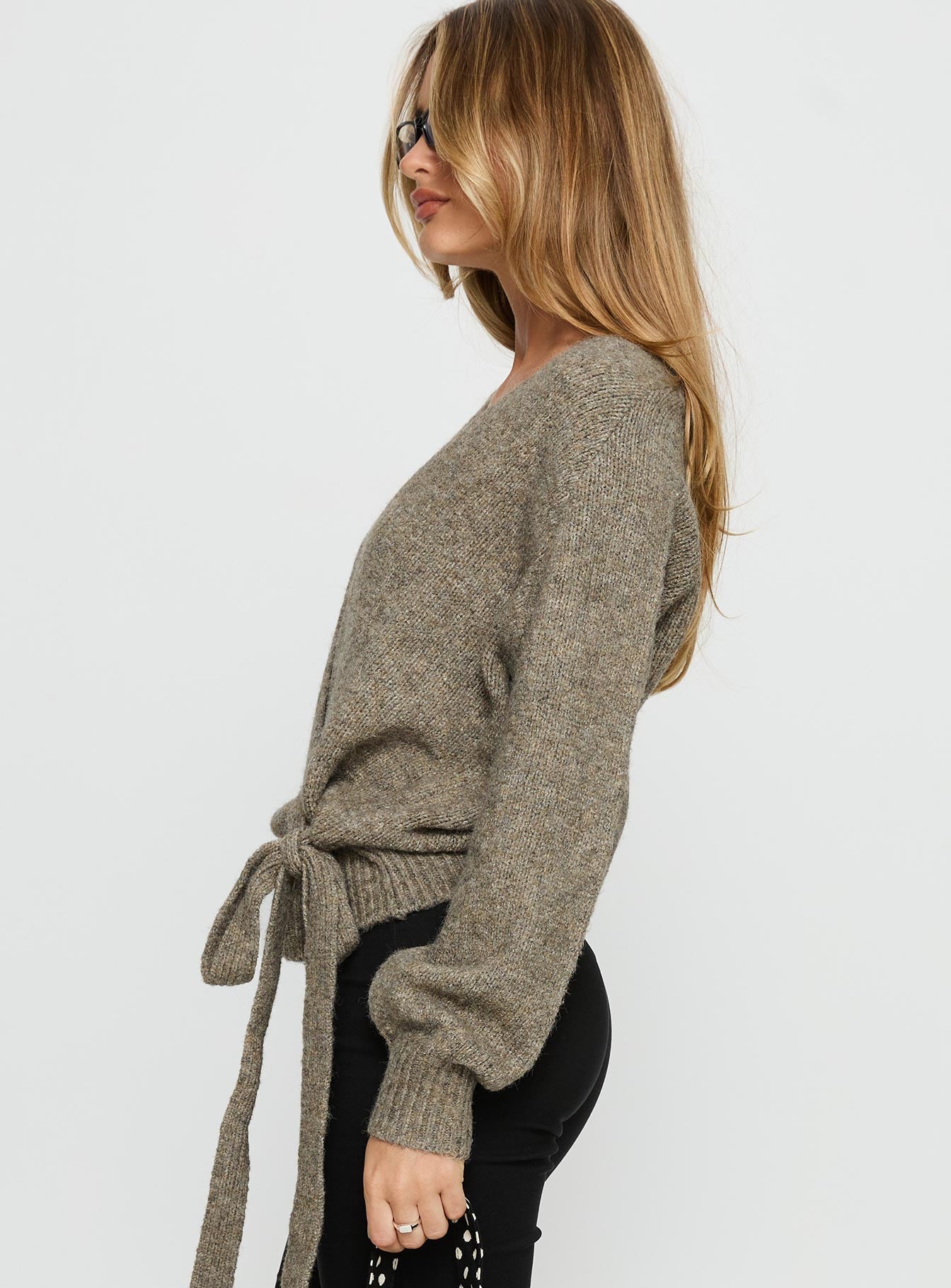 side view of model wearing Princess Polly Daelan Wrap Knit Cardigan Brown regular 