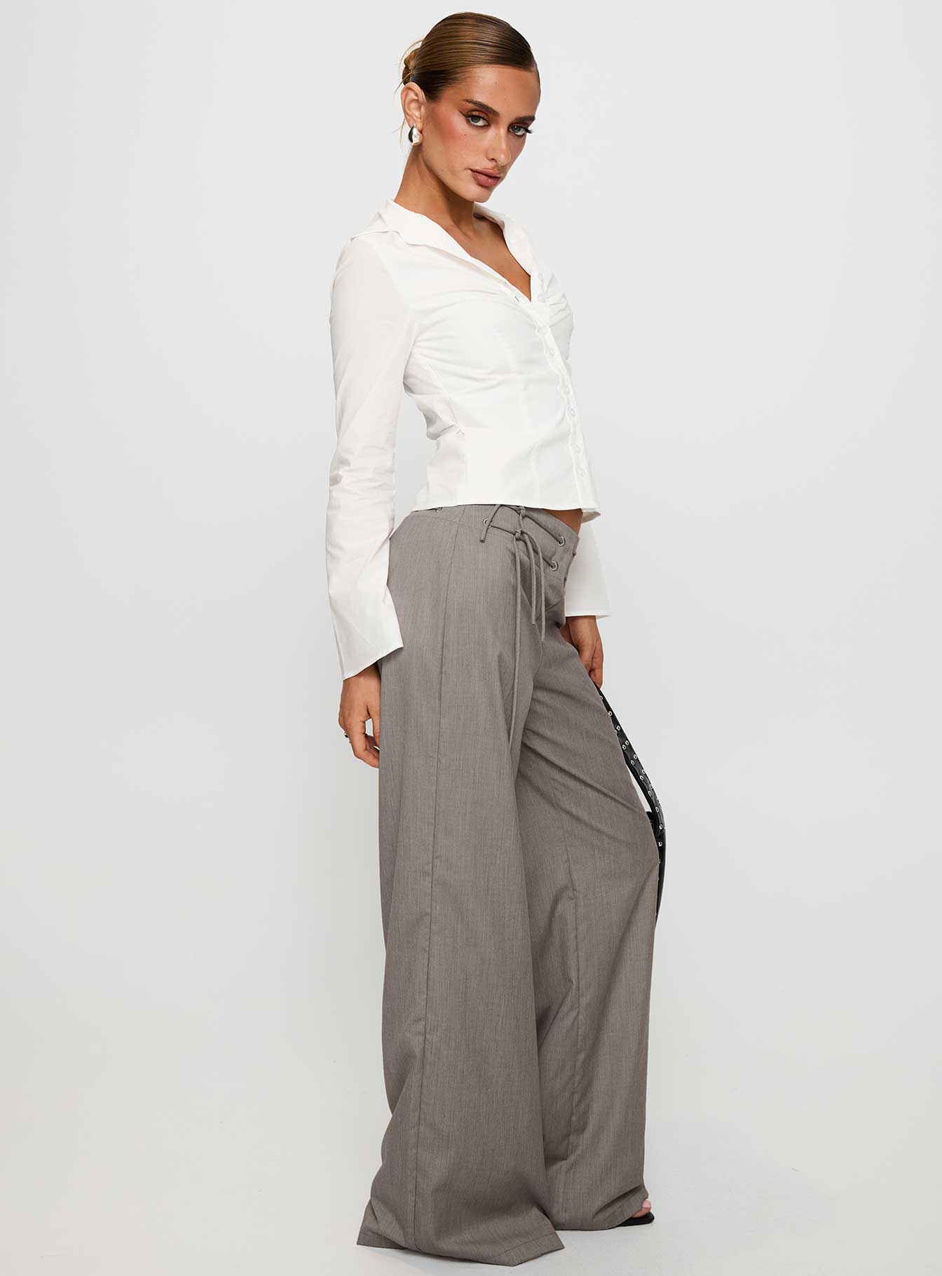 side view of model wearing Princess Polly Just Have Fun Wide Leg Pant Grey Petite High Waisted Pants 