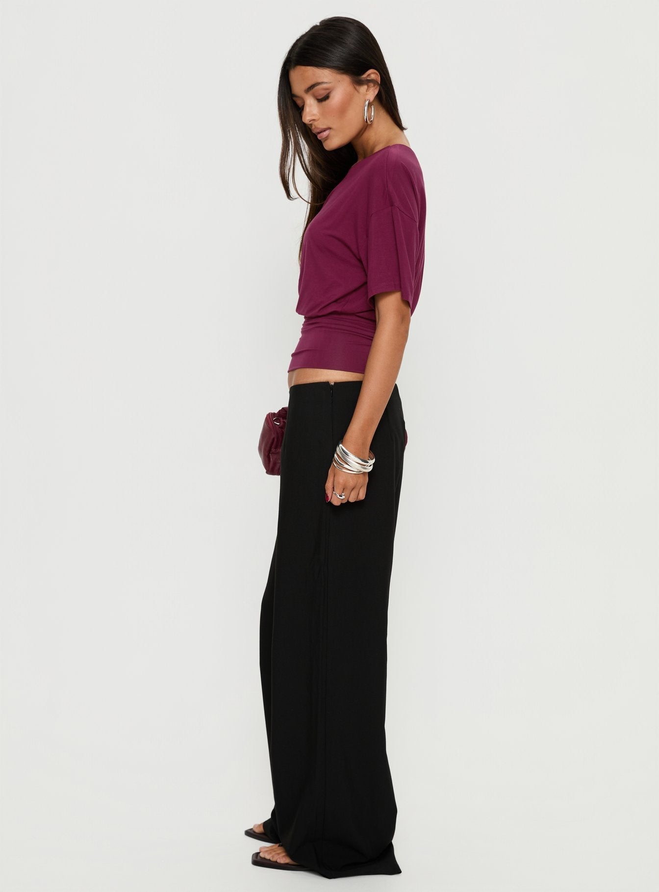 side view of model wearing Princess Polly Khane Low Rise Wide Leg Pant Black Low Rise Pants 