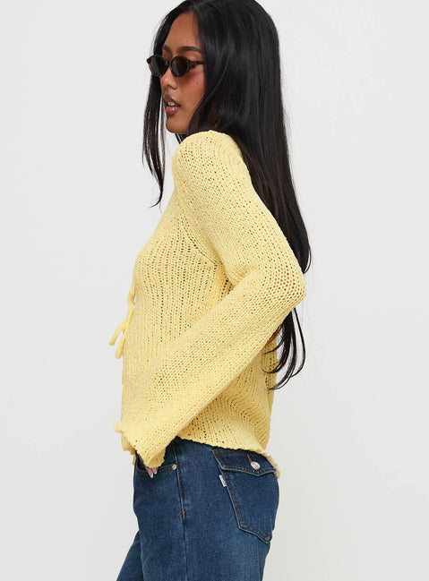 side view of model wearing Princess Polly Swain Knit Cardigan Lemon 