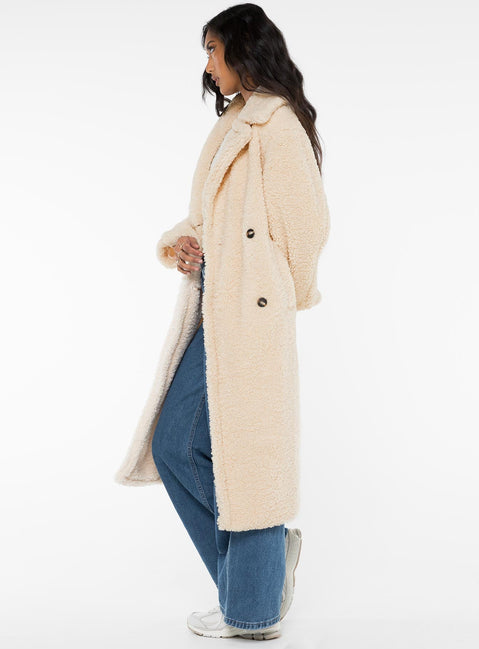 Long teddy coat Lapel collar, button fastening at front, twin hip pockets