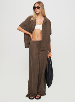 side view of model wearing Princess Polly Mahlab Pants Chocoloate High Waisted Pants 