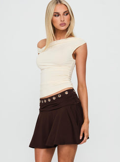   side view of model wearing Princess Polly Amryn Eyelet Mini Skirt Brown Mini Skirts 