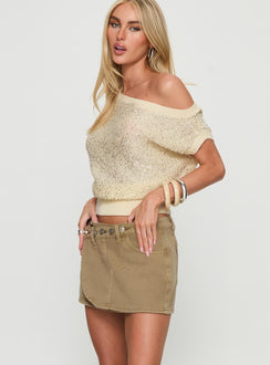   side view of model wearing Princess Polly Katlynne Button Detail Mini Skirt Washed Beige Mini Skirts 
