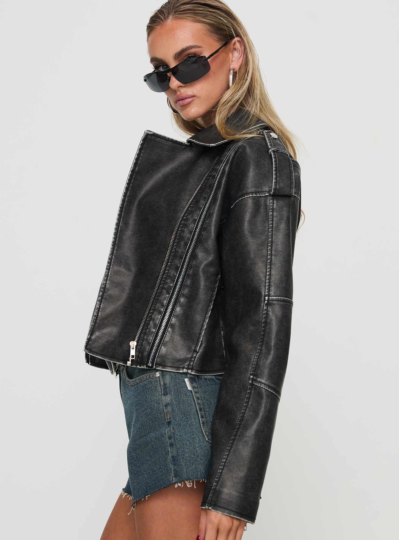 Faux leather jacket Classic collar, silver-toned hardware, twin pockets, dual zip fastening Non-stretch material, fully lined 