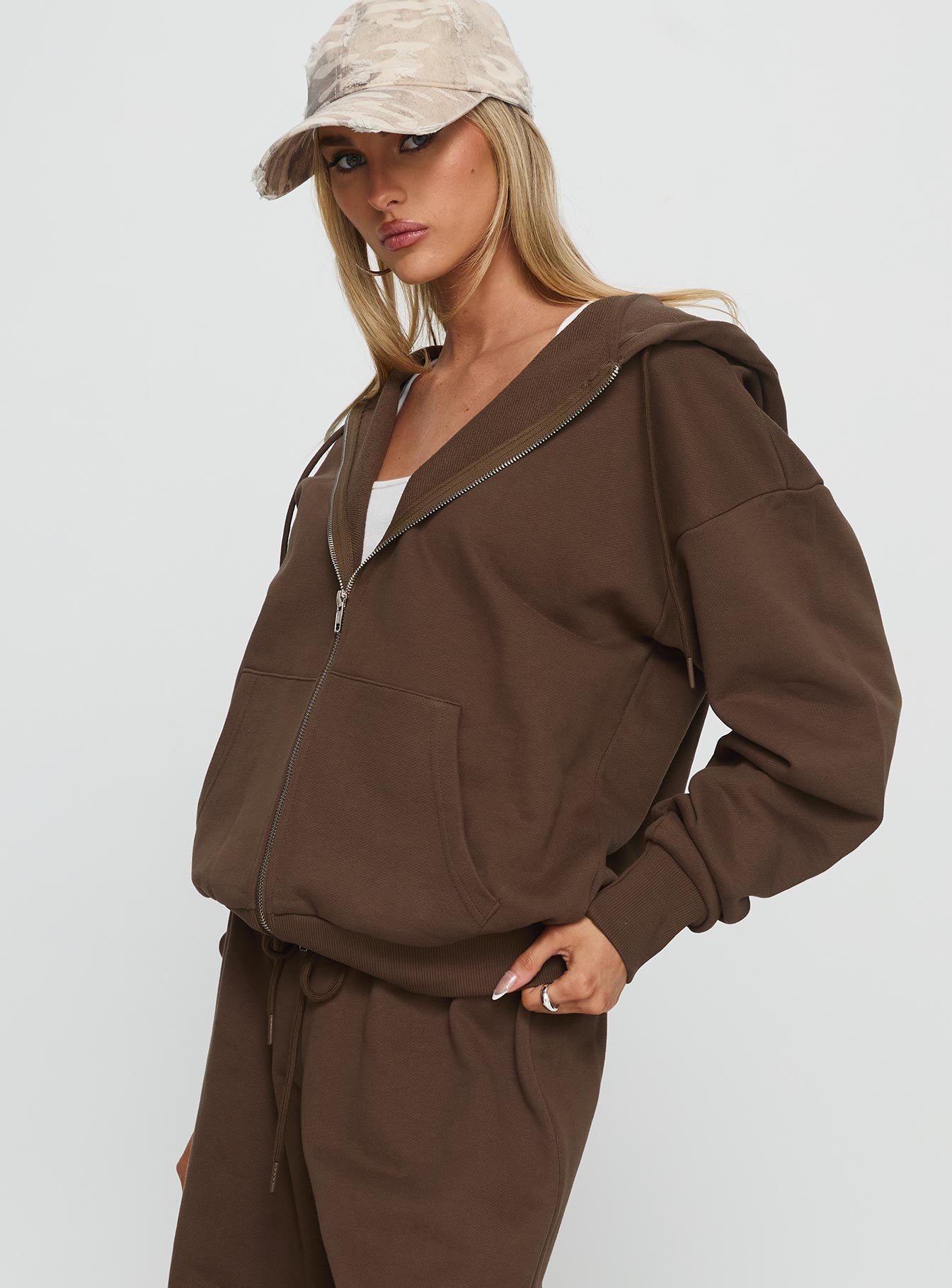 side view of model wearing Princess Polly All Day Oversized Hoodie Chocolate Longline Jumpers 