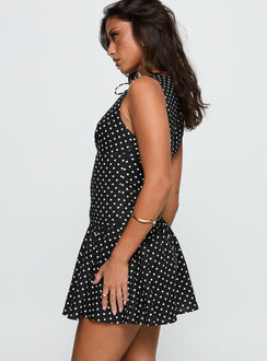side view of model wearing Princess Polly Alissea Keyhole Linen Blend Mini Dress Black Polka Crew Neck 