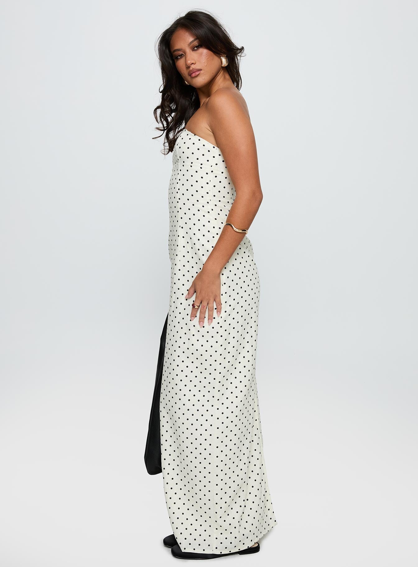side view of model wearing Princess Polly Dovie Linen Blend Strapless Midi Dress Cream Polka Straight Neck 