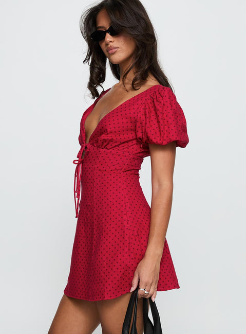 side view of model wearing Princess Polly Beloved Puff Sleeve Linen Blend Mini Dress Red Polka Plunger 