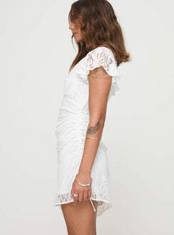 side view of model wearing Princess Polly Ramallo Lace Mini Dress White V-Neck 