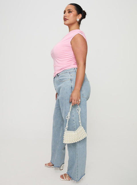 side view of model wearing Princess Polly Fawcett High Rise Straight Leg Jeans Light Blue Wash Curve High Rise Jeans Jeans 