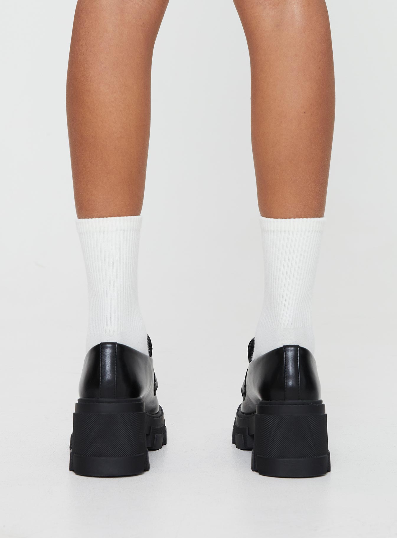 Faux leather loafer Rounded toe, platform base, padded footbed, treaded sole