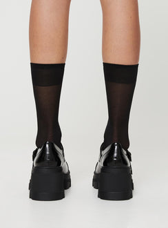 Loafer heels, faux patent leather material Buckle fastening, platform base, rounded toe, treaded sole