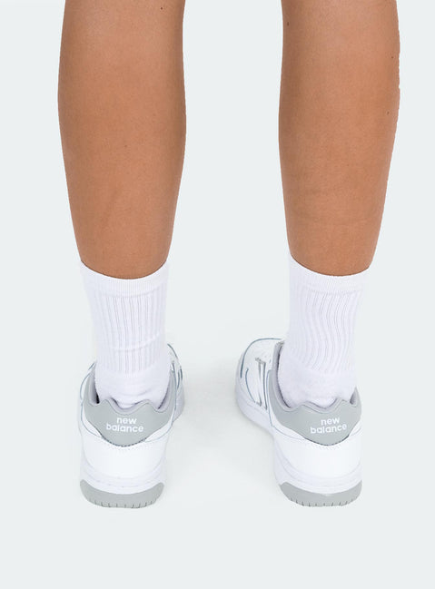 Sneakers Faux leather material Lace up fastening Padded footbed Rounded toe Treaded sole