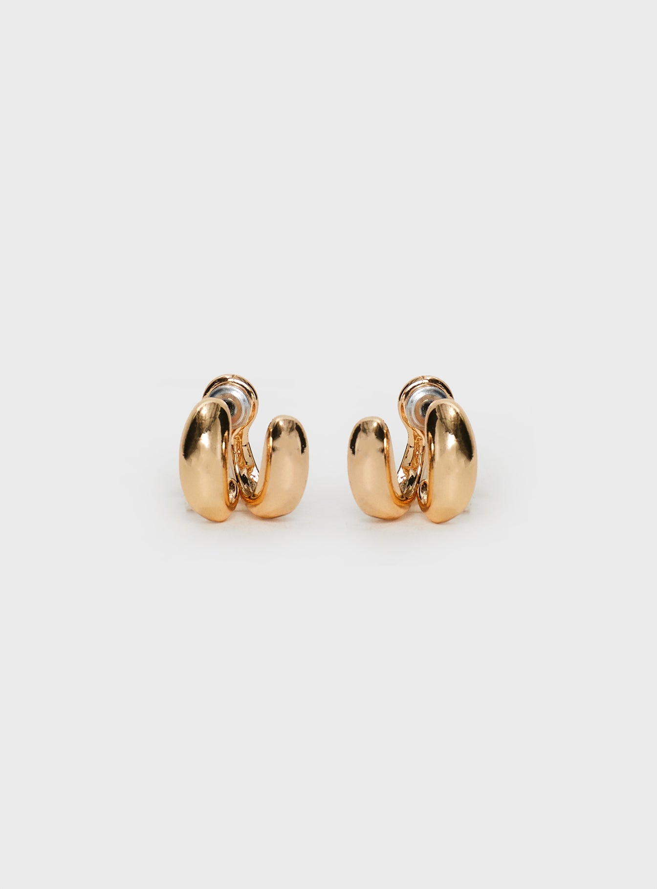 Gold-toned earrings Stud fastening, lightweight