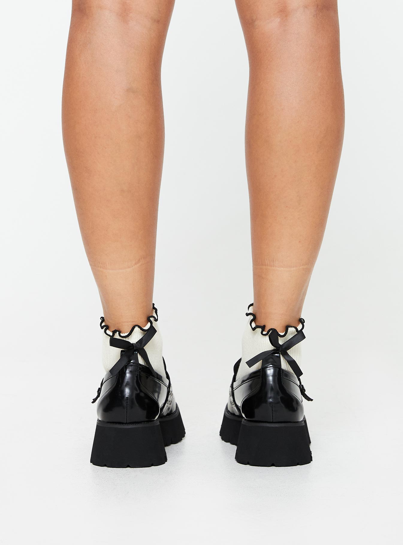 Faux leather loafers Silver-toned hardware Rounded toe, treaded sole, padded footbed, buckle detail, slip-on design