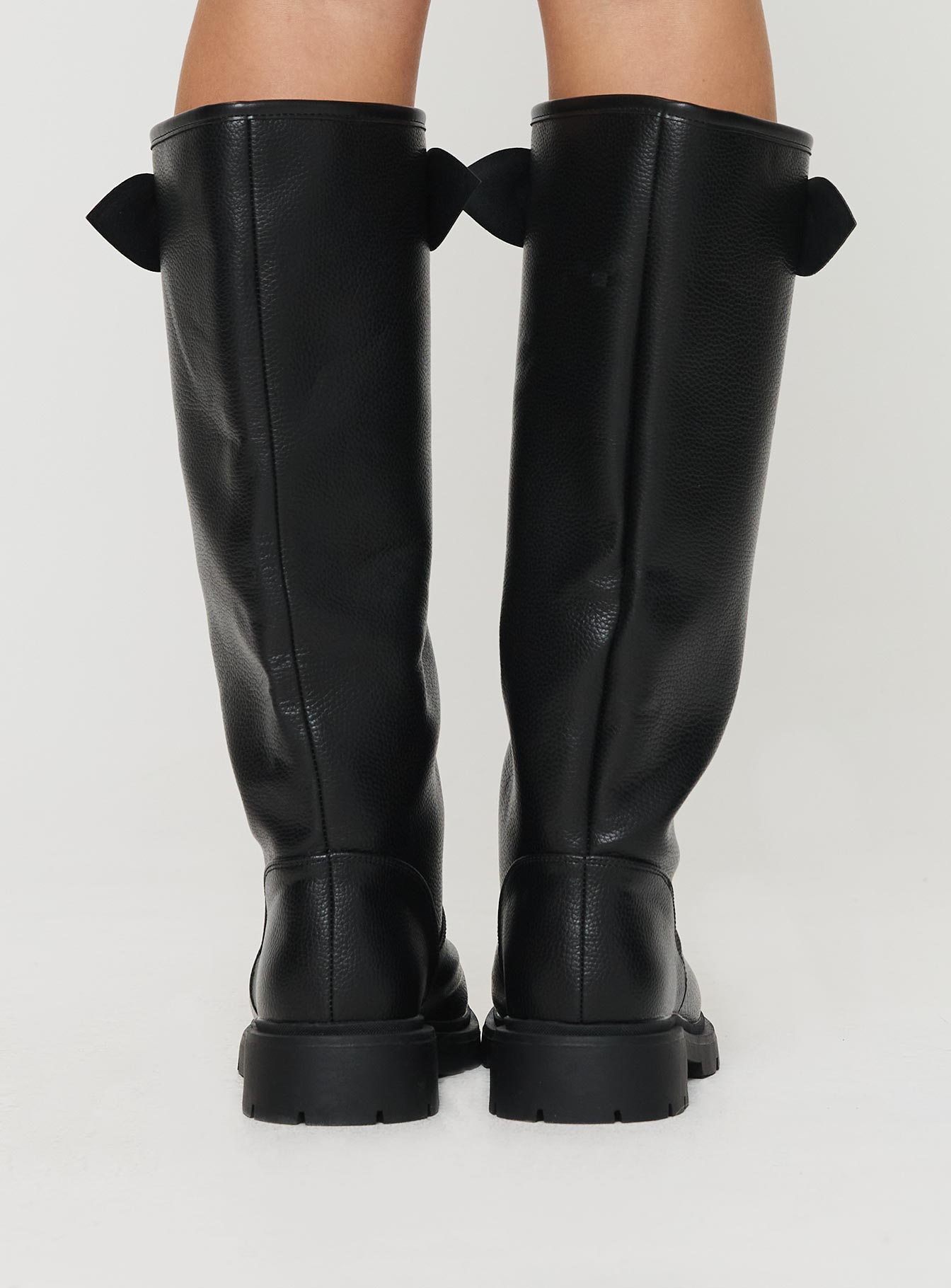 Knee-high boots Riding style, rounded toe, thick sole with grooves, gold-toned buckle detail