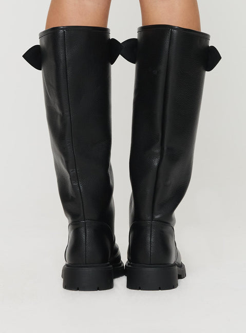 Knee-high boots Riding style, rounded toe, thick sole with grooves, gold-toned buckle detail