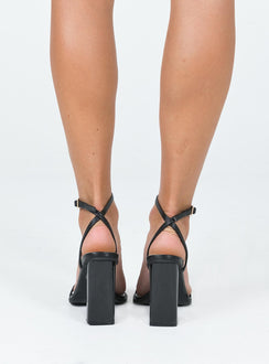 Heels Princess Polly Exclusive Upper & lining 100% PU  Outer 100% PVC  Faux leather material  Single thin upper  Ankle straps  Gold-toned buckle  Square toe  Padded footbed  Shaved block heel 