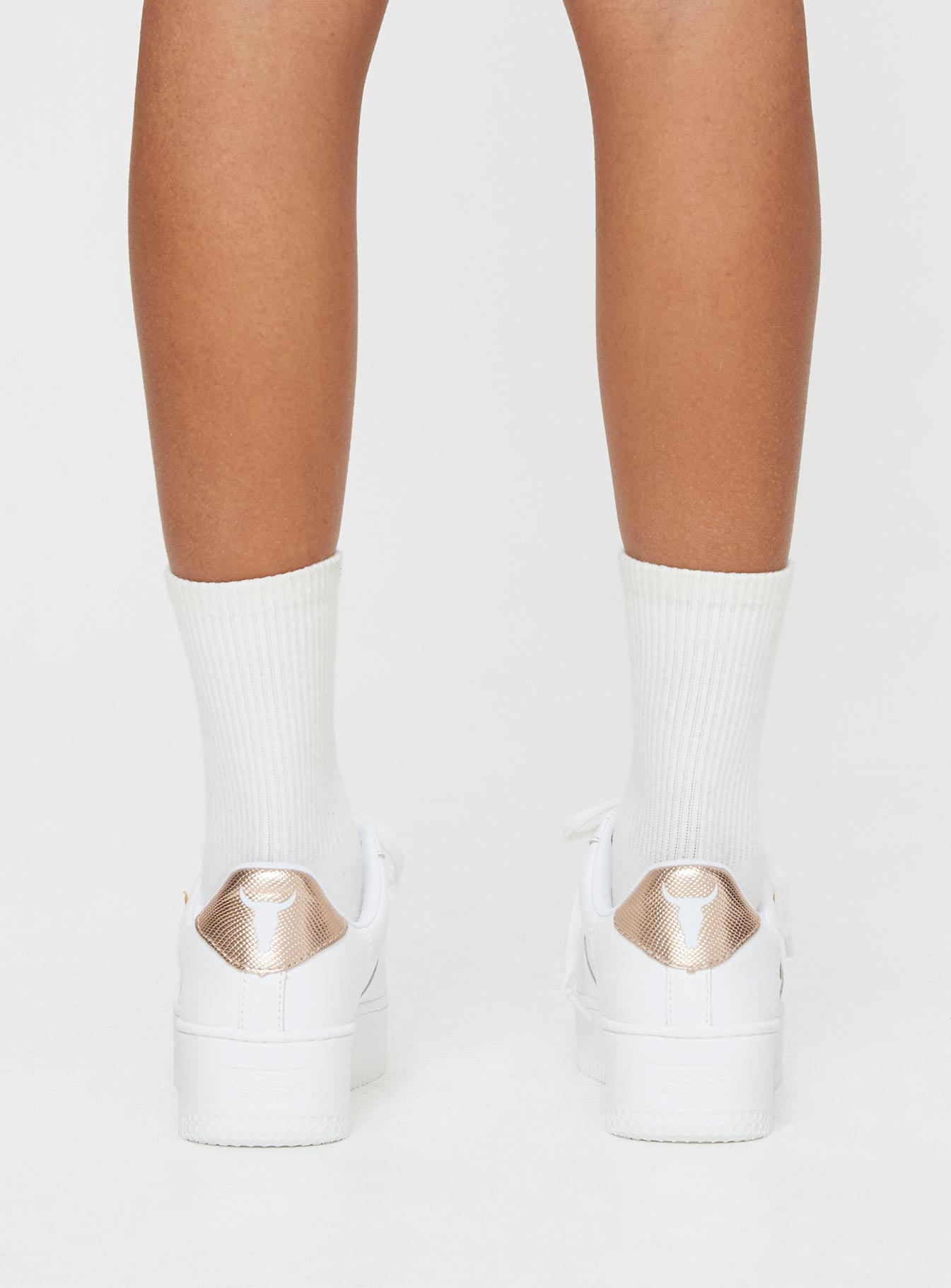 Faux leather sneakers Rounded toe, lace fastening, gold-toned hardware, platform base, passed footbed, treaded sole