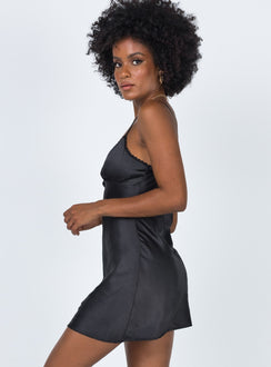 side view of model wearing Princess Polly Roman Mini Dress Black 