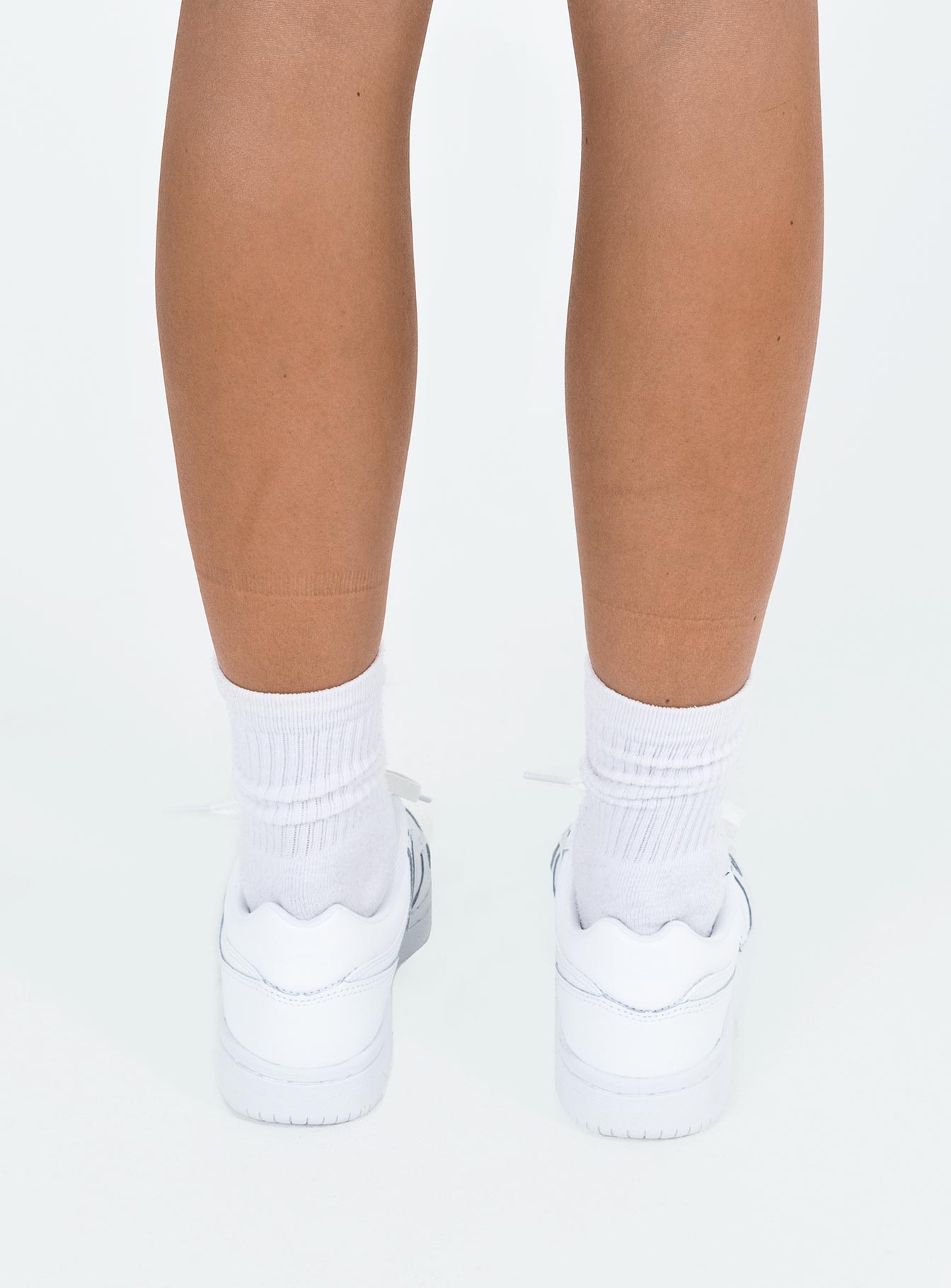 Sneakers Faux leather material Lace up fastening Padded footbed Rounded toe Treaded sole