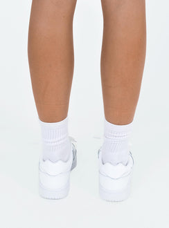 Sneakers Faux leather material Lace up fastening Padded footbed Rounded toe Treaded sole