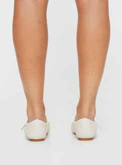 Faux leather ballet flats Single strap upper, square toe, padded footbed, buckle fastening