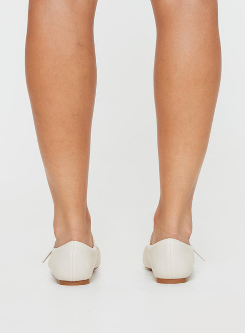 Faux leather ballet flats Single strap upper, square toe, padded footbed, buckle fastening