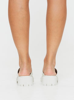 Faux leather slides Single thick strap upper, rounded toe, treaded sole, padded footbed