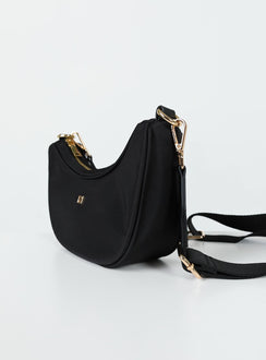 Crossbody bag Zip fastening Gold-toned hardware Two internal pockets Flat base