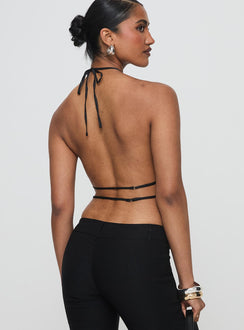 back view of model wearing Princess Polly Legacy Halter Top Onyx Sleeveless High Neck 