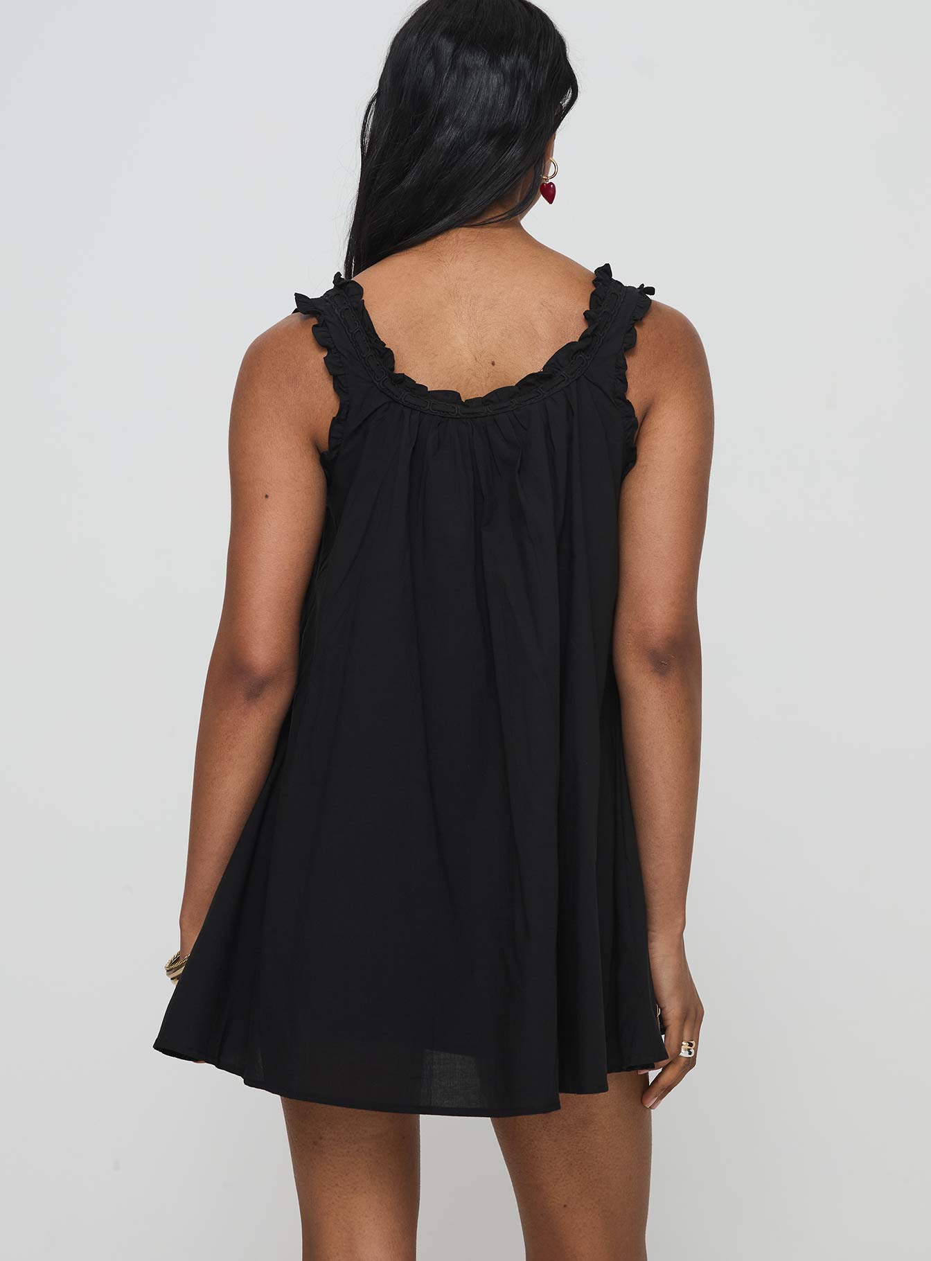 back view of model wearing Princess Polly Swing Mini Dress Black Square Neck 