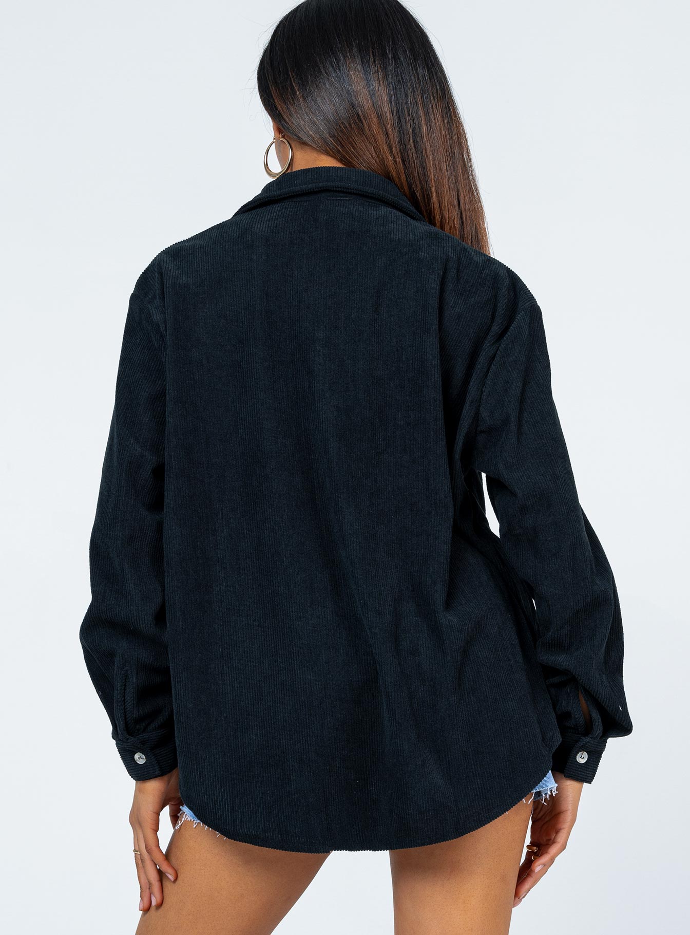 Oversized tshirt Cord material Button front fastening Scooped hem Single chest pocket