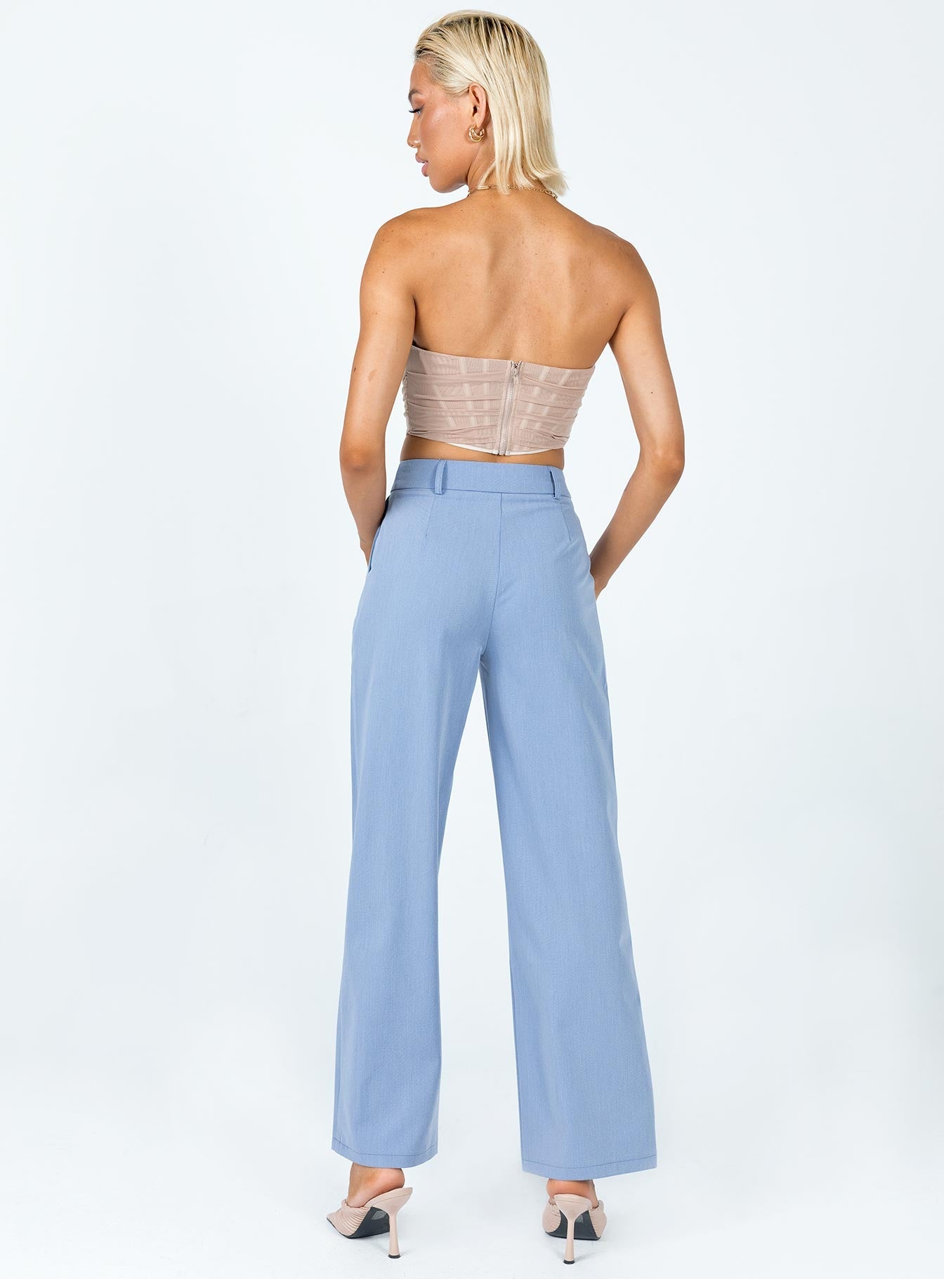 back view of model wearing Princess Polly Archer Pants Blue 