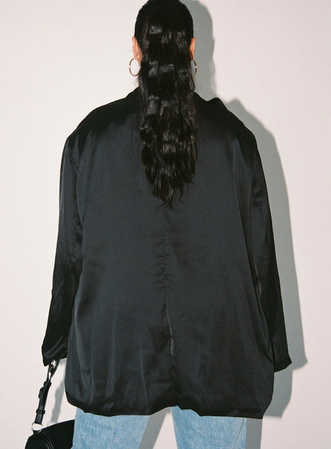 Blazer Satin material Lapel collar Button fastening at front Twin front pockets Slit at back Non-stretch Fully lined