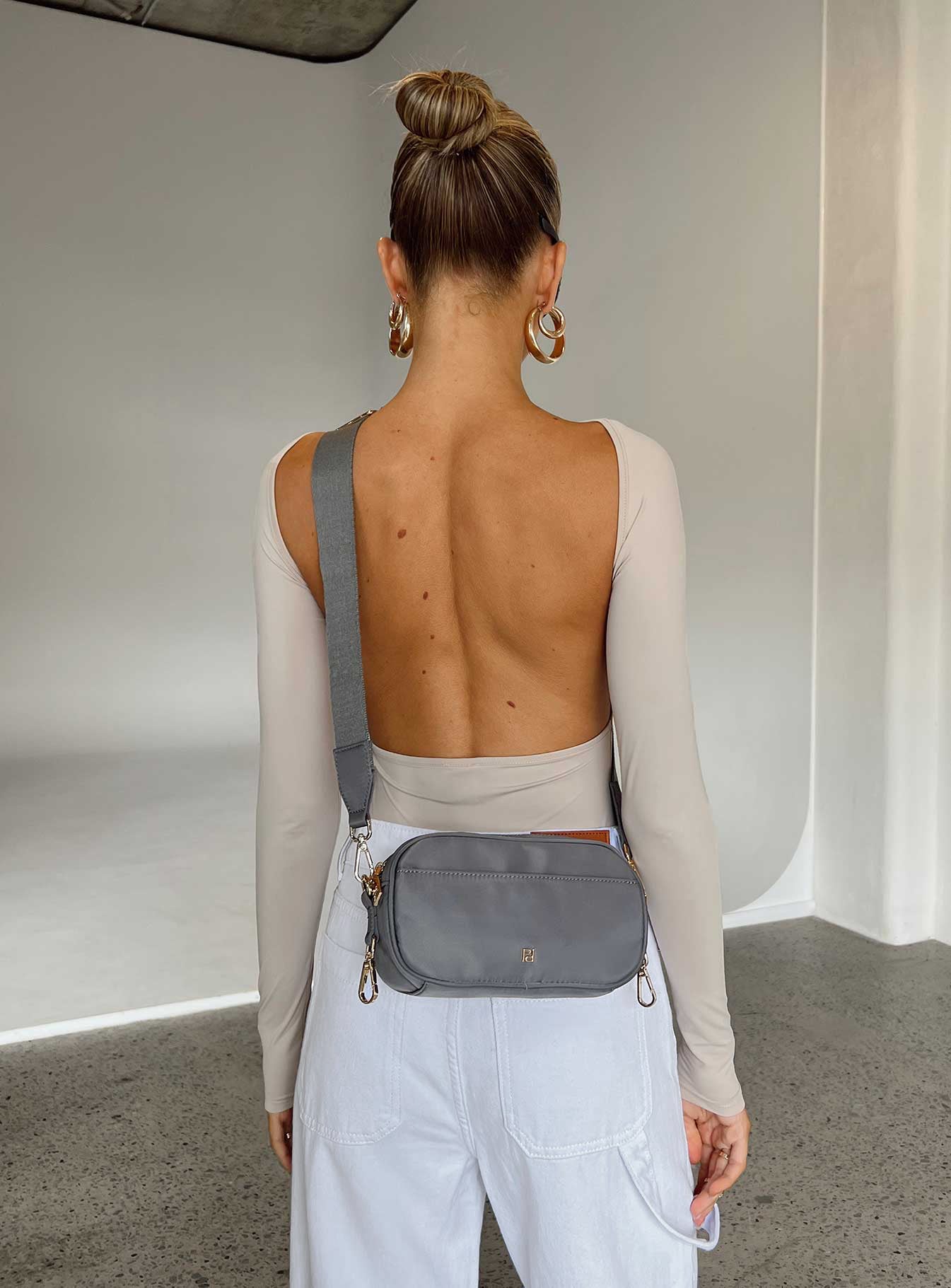 back view of model wearing Princess Polly Gatewood Long Sleeve Bodysuit Bone Full Sleeves 